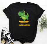 Black t-shirt with a cartoon dinosaur on a skateboard and 'Sahilsaurus' text, paired with black and white sneakers.