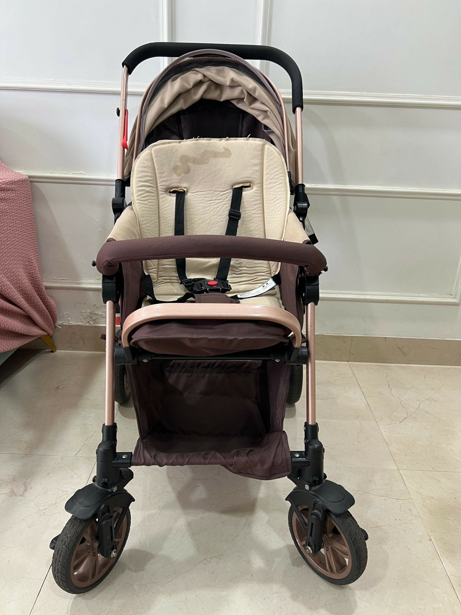 StarAndDaisy foldable baby stroller travel pram with reclining seat, sturdy wheels, safety harness, adjustable canopy, and compact foldable design for comfortable baby travel.