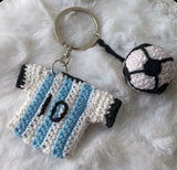Football and jersey combo keychain featuring a miniature football, personalized jersey charm, durable key ring, and stylish design for sports lovers, gifting, and everyday use.