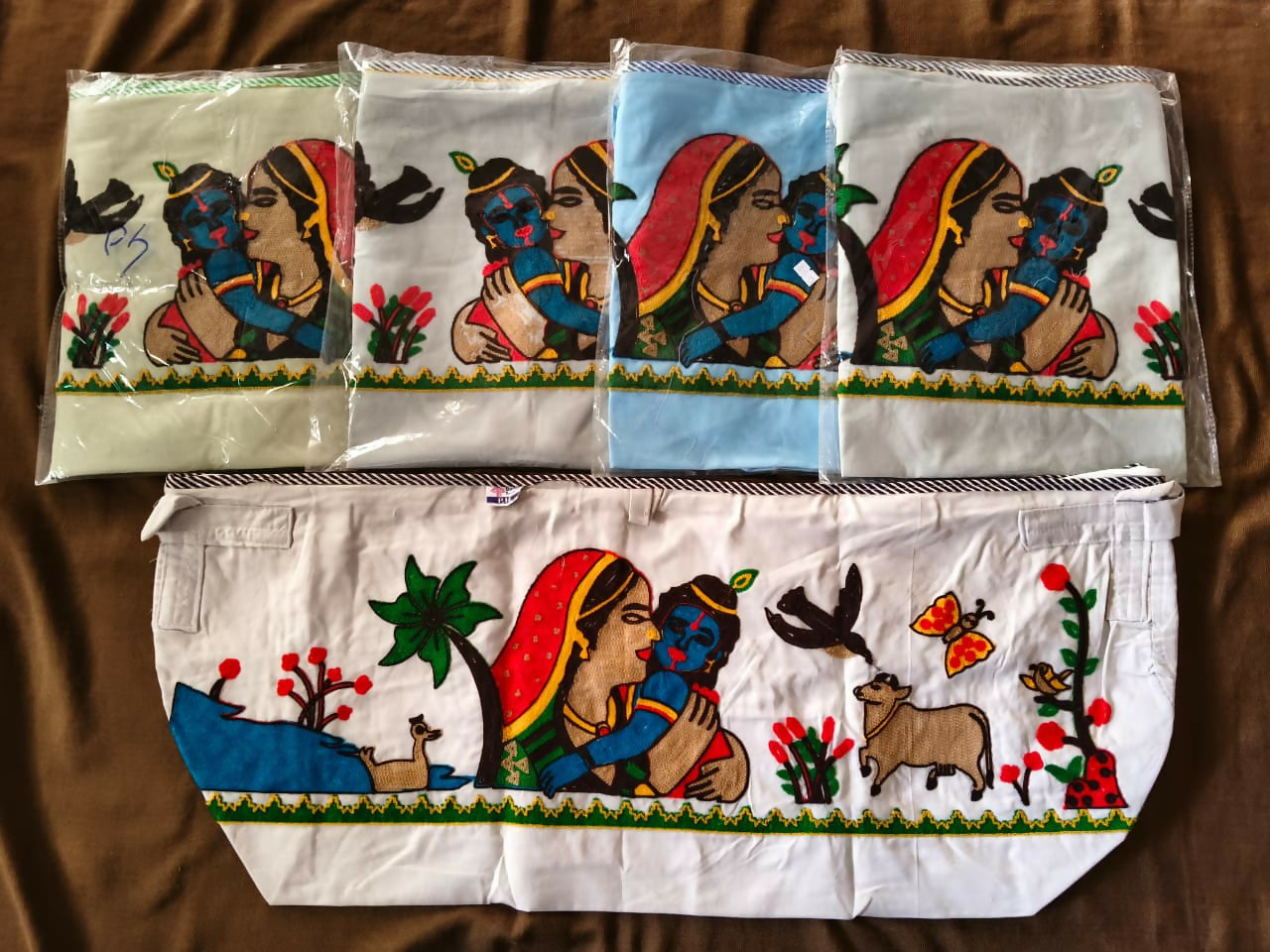 Multicolor baby quilt set with Krishna-themed print, made of soft cotton fabric, designed for cozy and comfortable sleep for babies