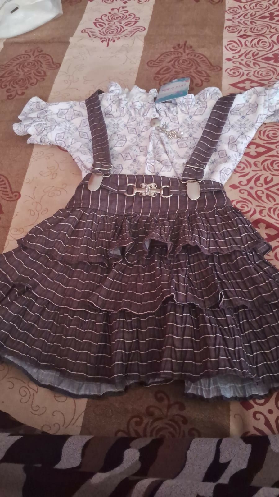 Girls midi dungaree in brown and white color with soft fabric, comfortable fit, stylish design, and charming look for casual outings and everyday wear.
