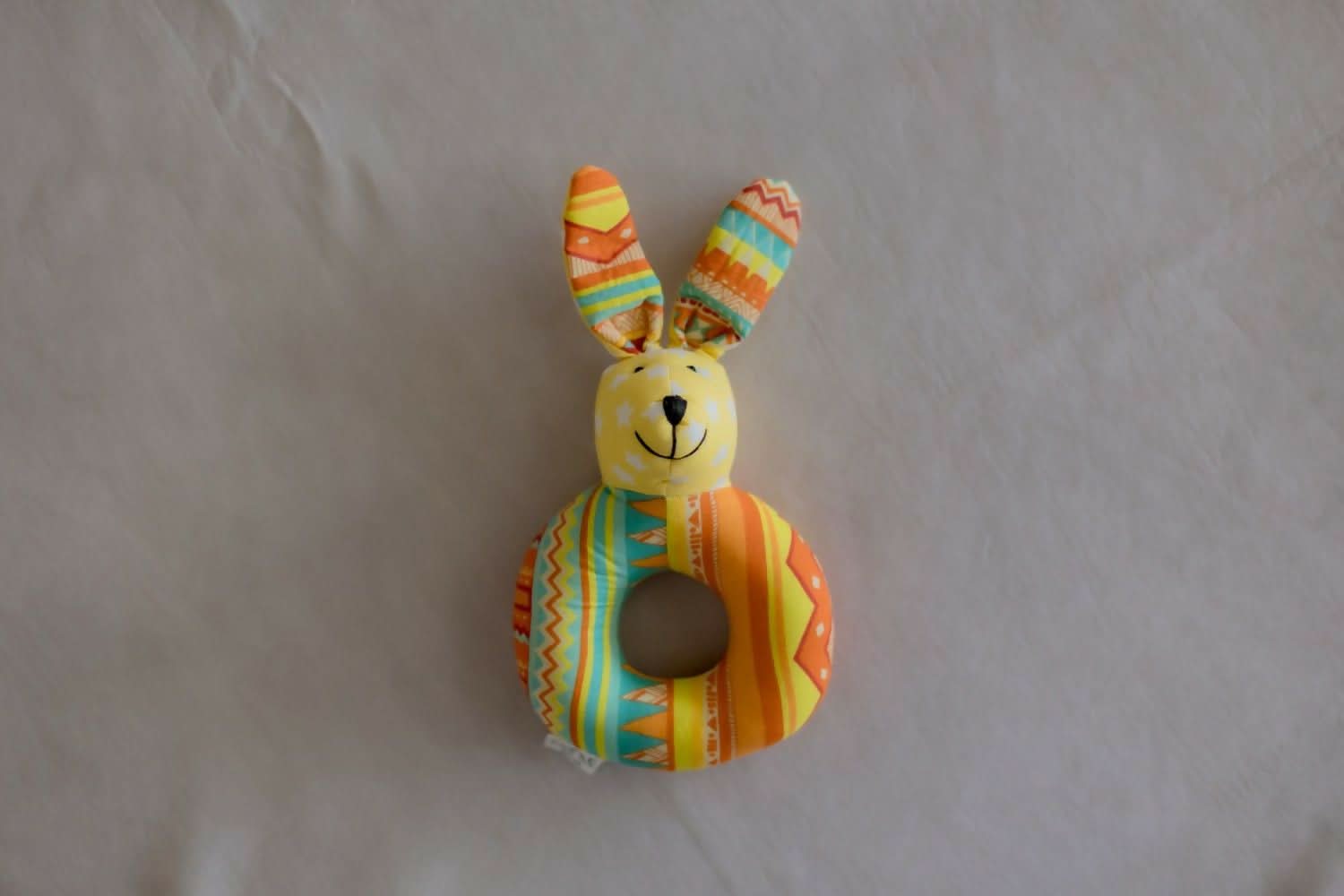 Introducing our Kangroo Faced Shape Rattle, a delightful and eco-conscious sensory toy crafted with care and consideration.
