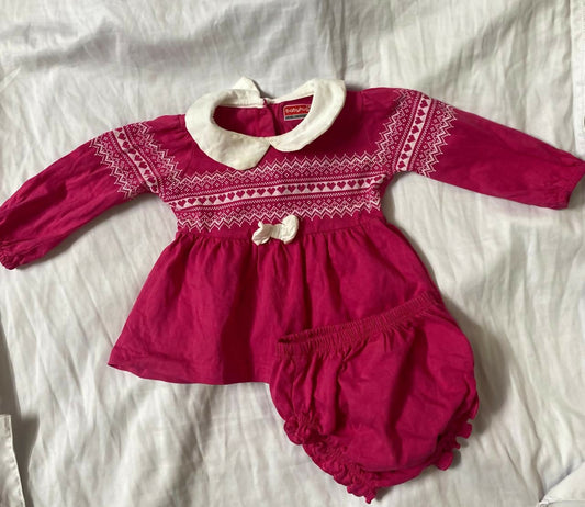 Elevate your baby girl's wardrobe with BABYHUG Frock/Dress, crafted from premium fabrics and adorned with charming details for timeless elegance. Perfect for any occasion, these dresses ensure comfort and style for your little princess.