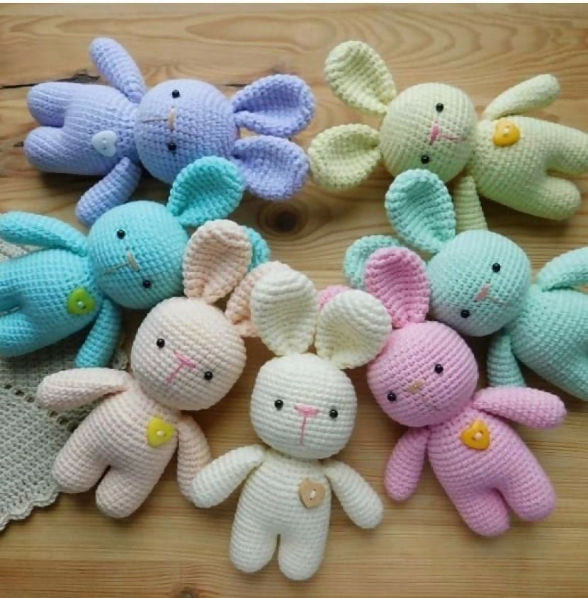 Handcrafted crochet bunny made from soft yarn with intricate stitching, adorable floppy ears, and a cuddly design, perfect for babies, kids, gifting, and nursery décor.