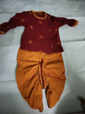 Dress your little prince in elegance with the Tiber Taber Dhoti Kurta Set, offering traditional charm and contemporary style for special occasions.
