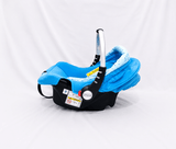 BABYHUG infant car seat carry cot with canopy, rear-facing design, cushioned seating, 5-point safety harness, ergonomic carry handle, and sun-protective canopy for newborns and infants up to 13 kg.