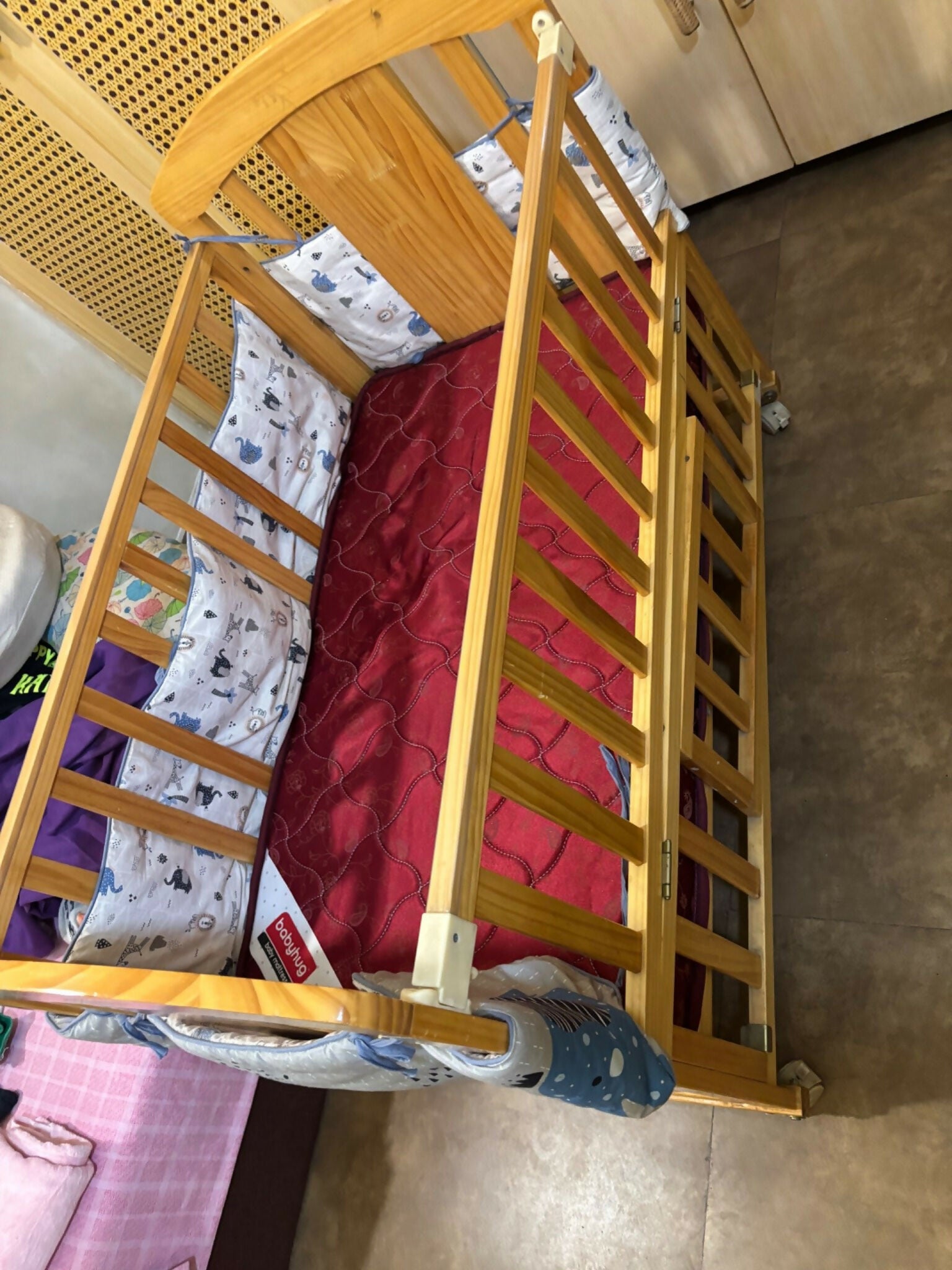 Baby cot/crib with a sturdy construction, comfortable sleeping space, smooth rounded edges, adjustable mattress support, and a safe design for newborns and growing babies.