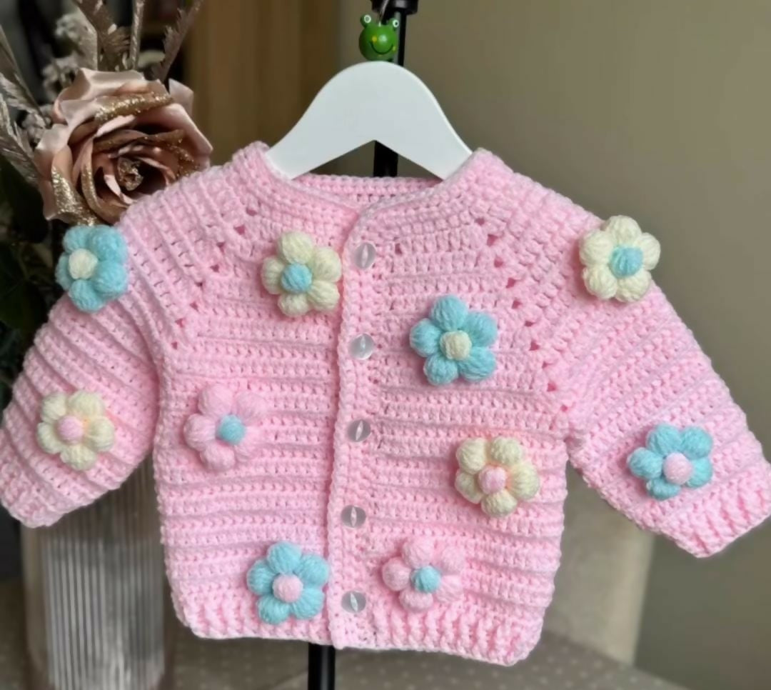 Baby sweater, headband, booties, cap, and mittens set – a cozy and stylish outfit to keep your little one warm and comfortable.