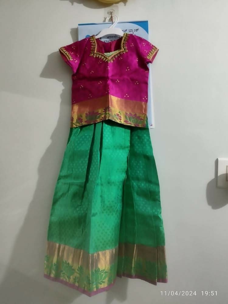 Dress your little girl in luxury and elegance with our Silk Lehenga and Blouse set, perfect for special occasions and celebrations.