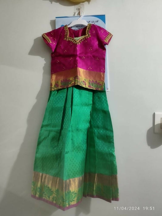 Dress your little girl in luxury and elegance with our Silk Lehenga and Blouse set, perfect for special occasions and celebrations.