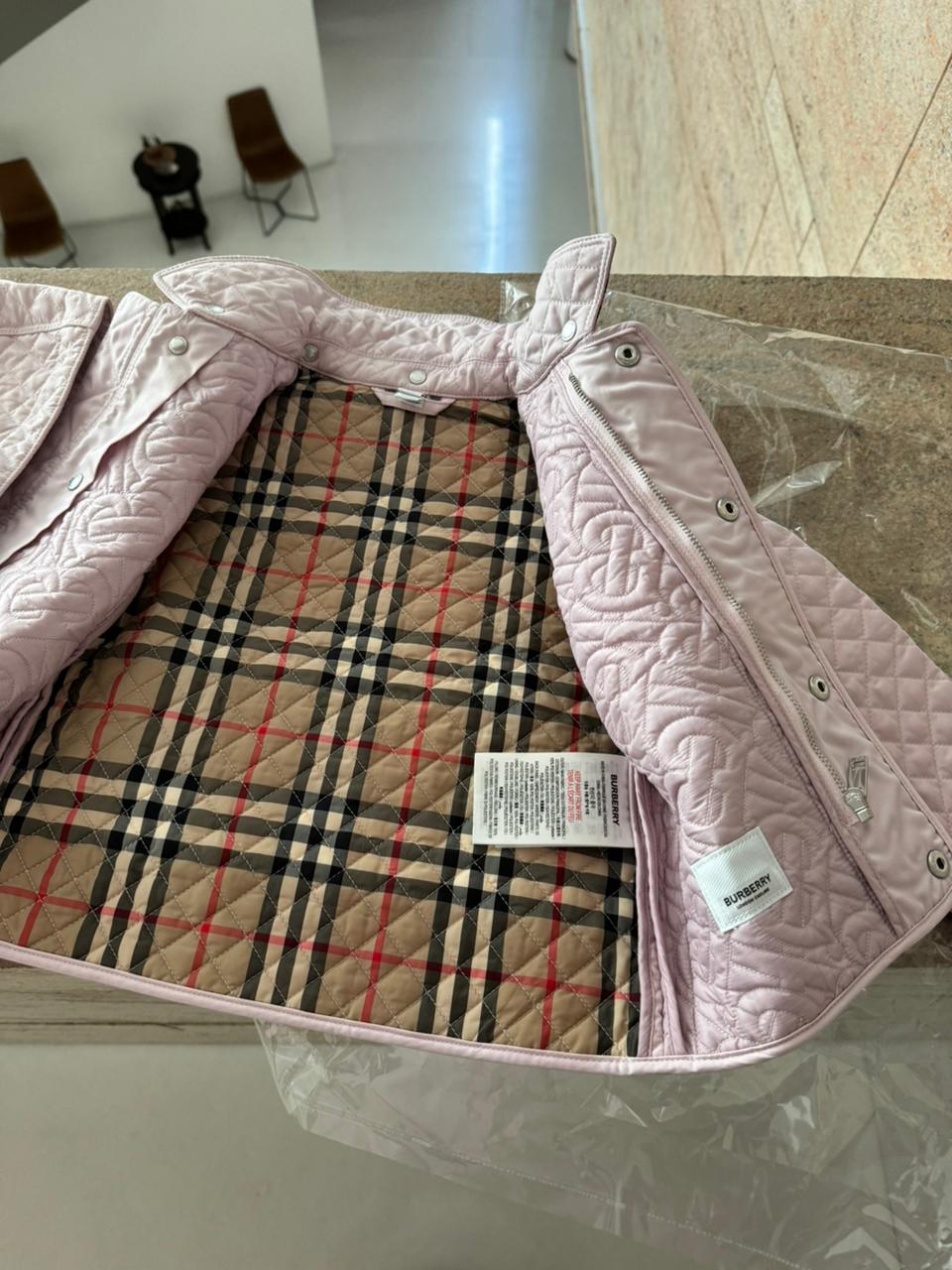 Dress your little fashionista in luxury with the Stylish Burberry Jacket with Detachable Hood - iconic style for every precious moment!