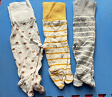 MOTHERCARE 3-pack cotton footed lowers – soft, breathable, and cozy baby essentials.