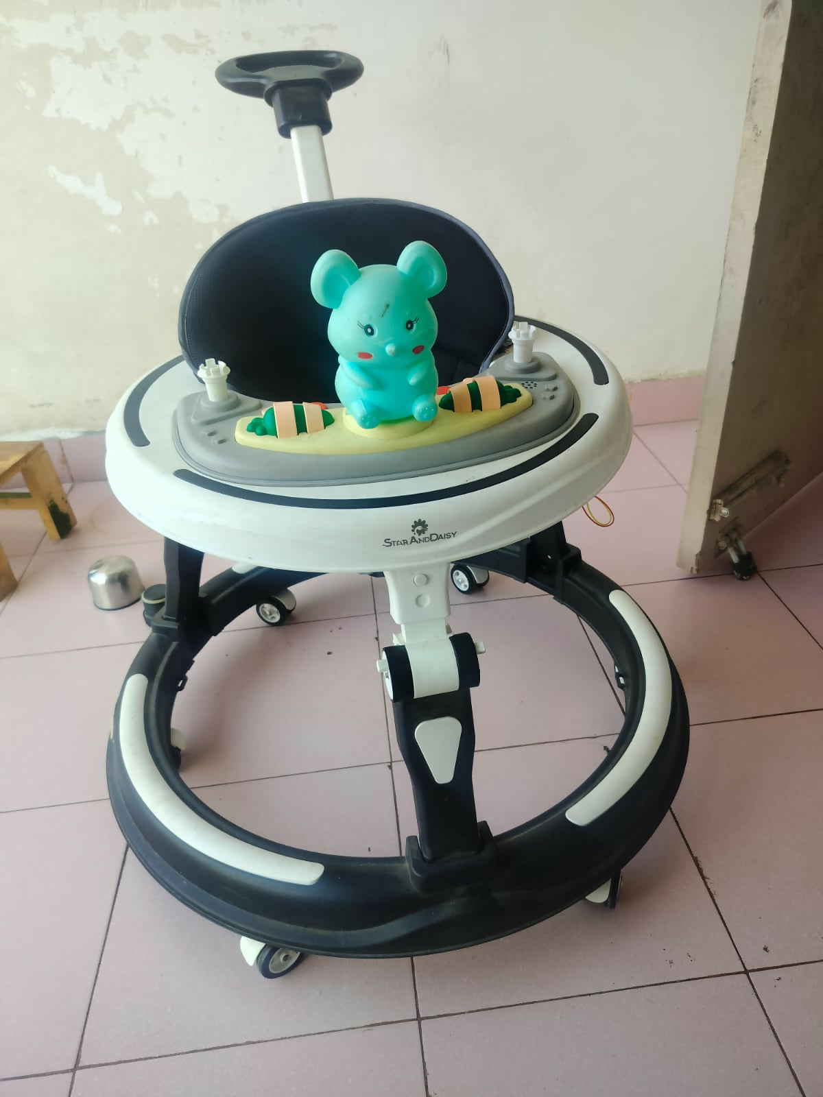 StarAndDaisy 3-in-1 baby walker with parent handle and musical tray, almost new condition