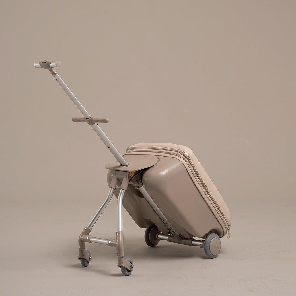Beige suitcase with retractable handle on a beige background