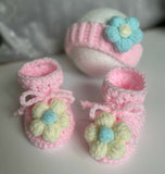 Baby sweater, headband, booties, cap, and mittens set – a cozy and stylish outfit to keep your little one warm and comfortable.