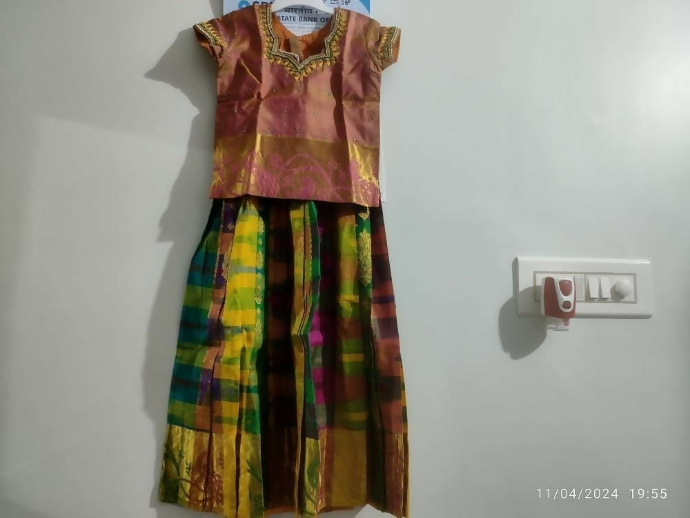 Dress your little girl in luxury and elegance with our Silk Lehenga and Blouse set, perfect for special occasions and celebrations.