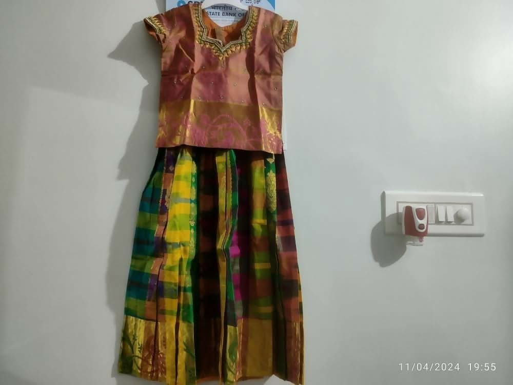 Dress your little girl in luxury and elegance with our Silk Lehenga and Blouse set, perfect for special occasions and celebrations.