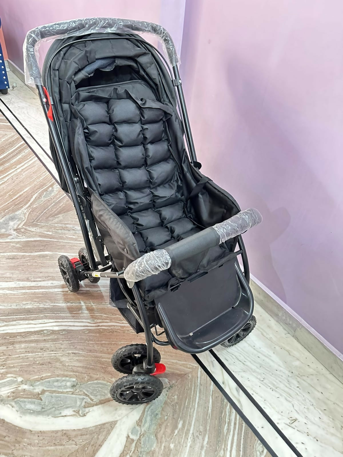 LUVLAP Starshine Baby Stroller/Pram with comfortable reclining seat, foldable frame, adjustable canopy, safety harness, smooth wheels, and convenient storage basket for everyday outings with babies and toddlers.