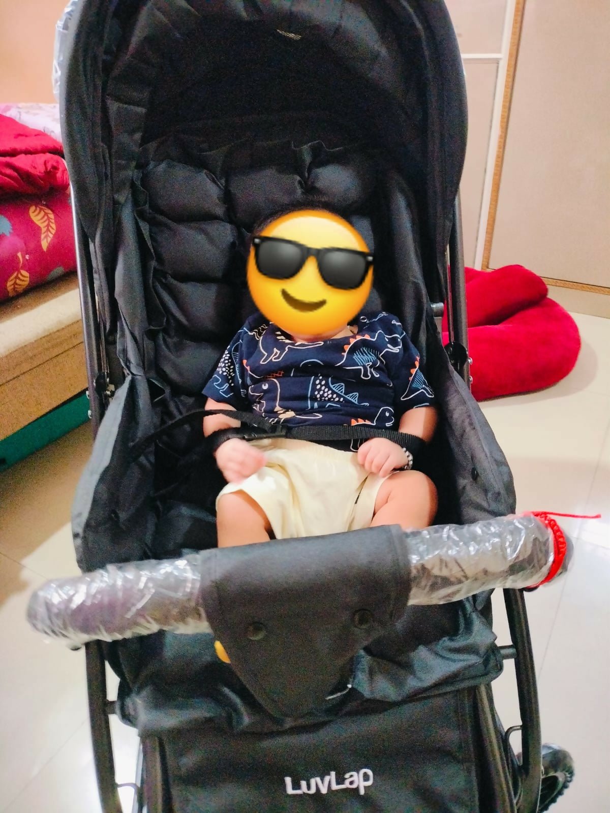 LUVLAP Starshine pram stroller with reclining seat, smooth wheels, safety harness, adjustable canopy, and comfortable travel design for babies and toddlers.