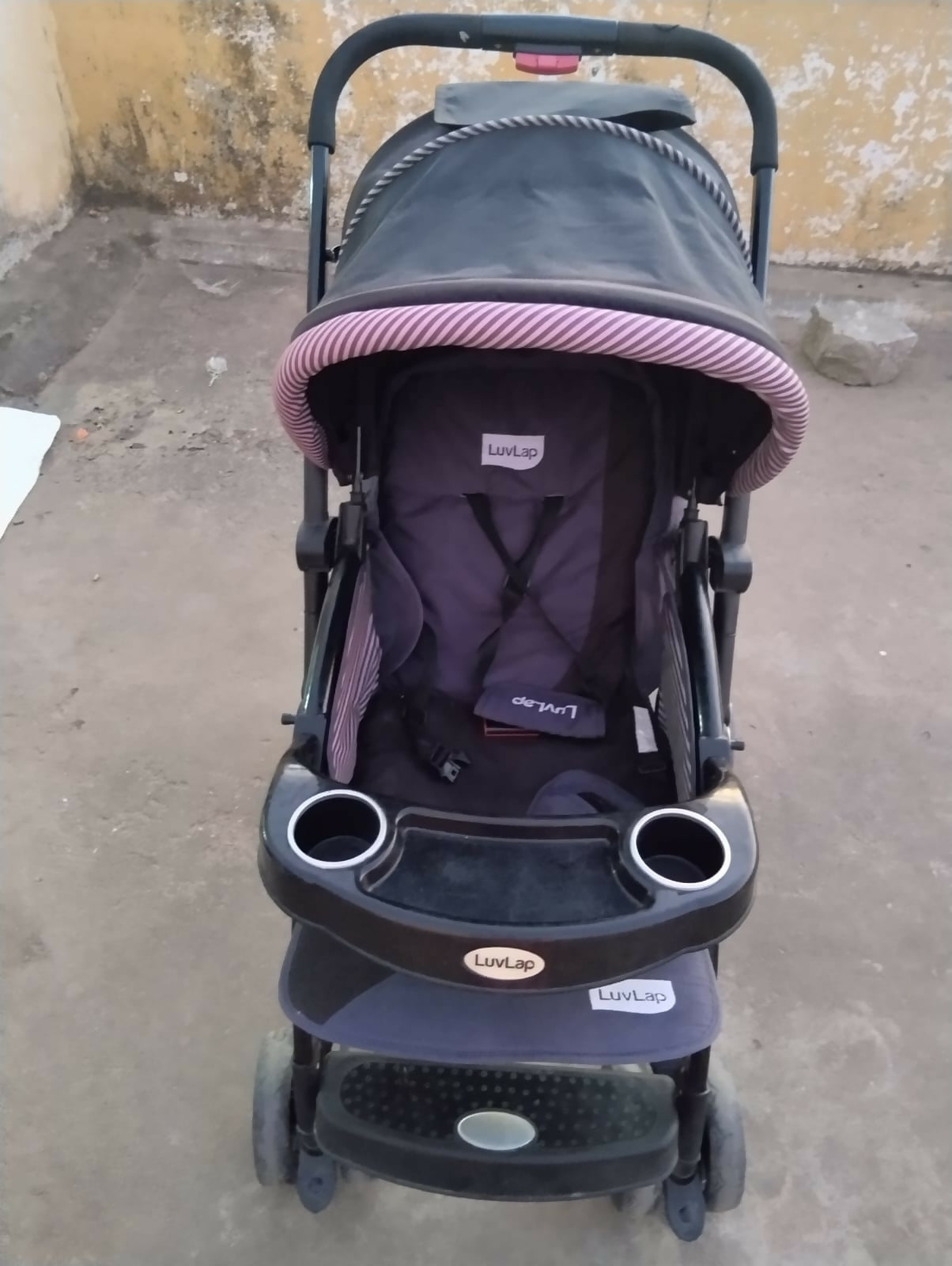 LuvLap stroller/pram with a reclining seat, 5-point safety harness, adjustable canopy, smooth wheels, spacious storage basket, and a lightweight foldable design for everyday outings.