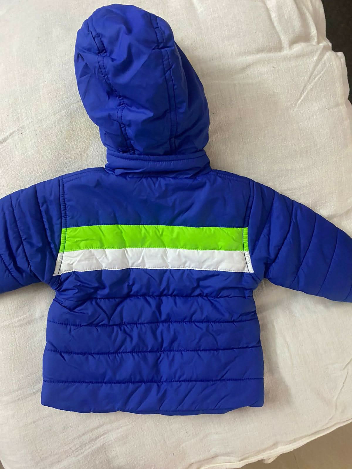 Keep your baby warm and stylish with the BLUE N PINK Jacket, crafted for comfort and cuteness in every outing.