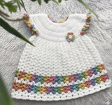 White crocheted baby dress