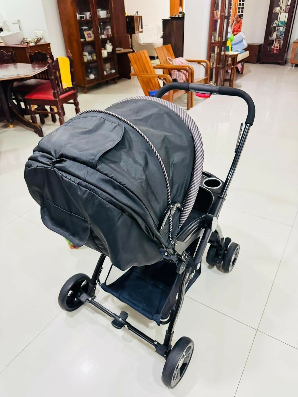 LuvLap baby stroller with lightweight foldable design, reclining seat, adjustable canopy, 5-point safety harness, smooth wheels, and storage basket for comfortable travel with babies and toddlers.