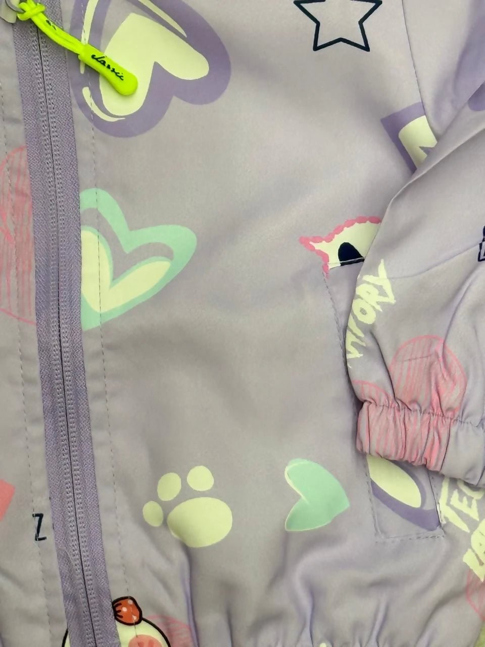 Children's jacket with colorful patterns and a zipper