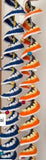 Colorful shoelaces displayed in a pattern on a white background