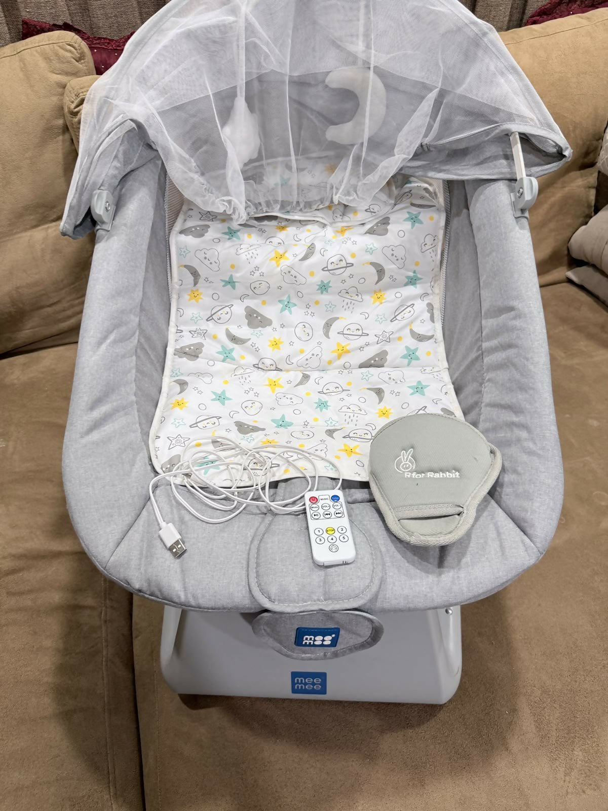 MEE MEE Electric Baby Swing (0–2 Years) with gentle automatic swinging, comfortable padded seat, adjustable recline, safety harness, soothing music, and sturdy frame for relaxing and entertaining babies.