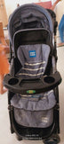 MEE MEE stroller and pram with rocker function, reclining seat, smooth wheels, safety harness, adjustable canopy, and dual stroller-to-rocker design for baby comfort and travel.