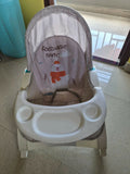 MISS & CHIEF Portable Baby Rocker & Bouncer with a comfortable padded seat, gentle rocking motion, safety harness, sturdy frame, and lightweight foldable design for babies.