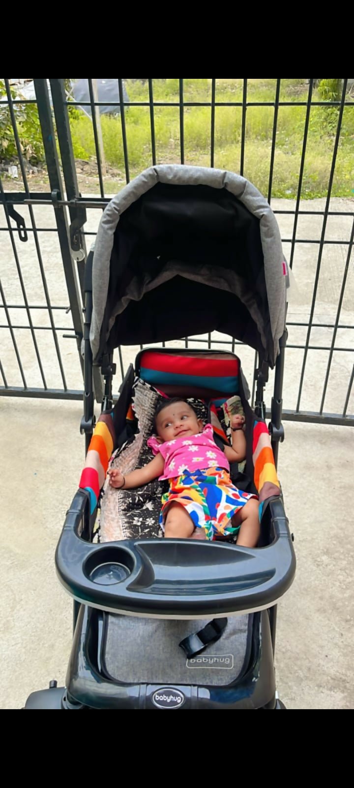 BABYHUG Melody stroller with reversible handle and canopy, reclining seat, smooth wheels, safety harness, and comfortable travel design for babies and toddlers.
