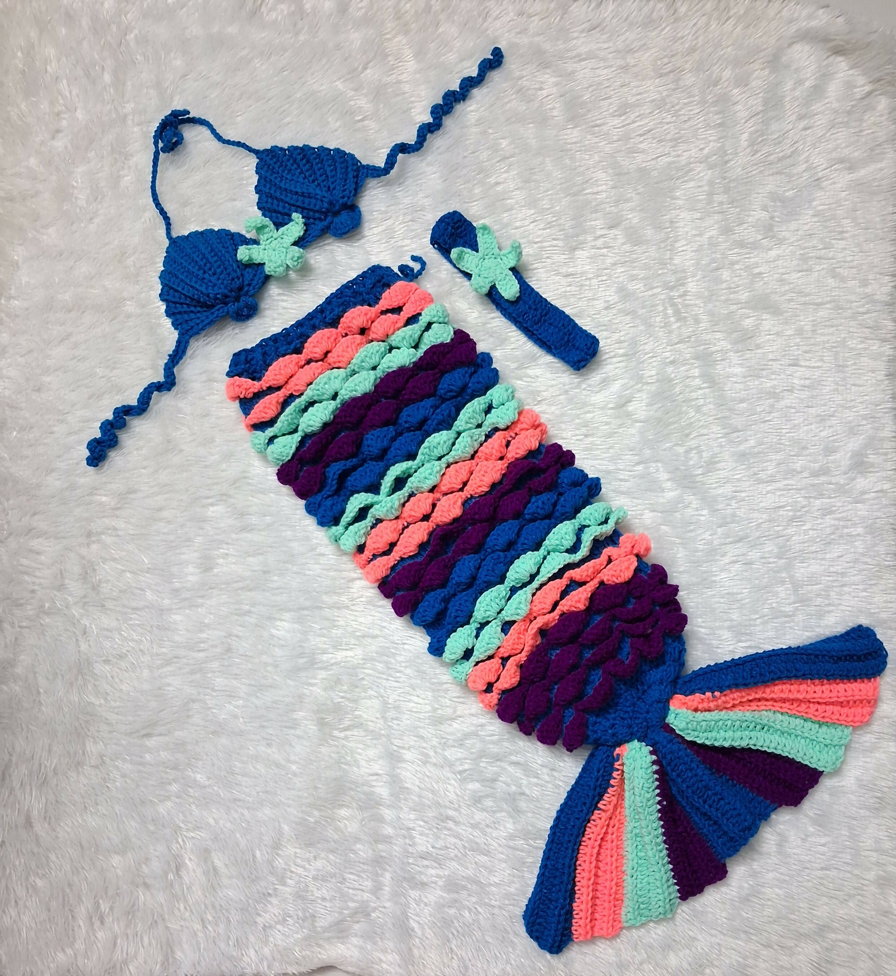 Crochet Mermaid Dress for Baby Girl featuring a charming handmade crochet design with beautiful mermaid-inspired detailing, ideal for photoshoots, birthdays, celebrations and other special occasions.