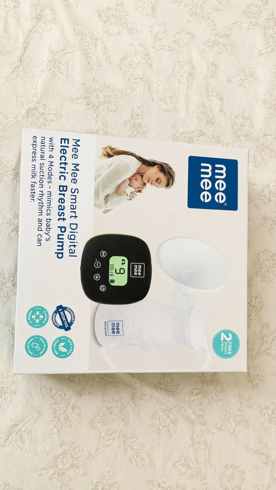 MEE MEE Electric Breast Pump with adjustable suction levels, soft silicone massage cushion, quiet operation, rechargeable design, BPA-free components, and ergonomic controls for comfortable and efficient milk expression.