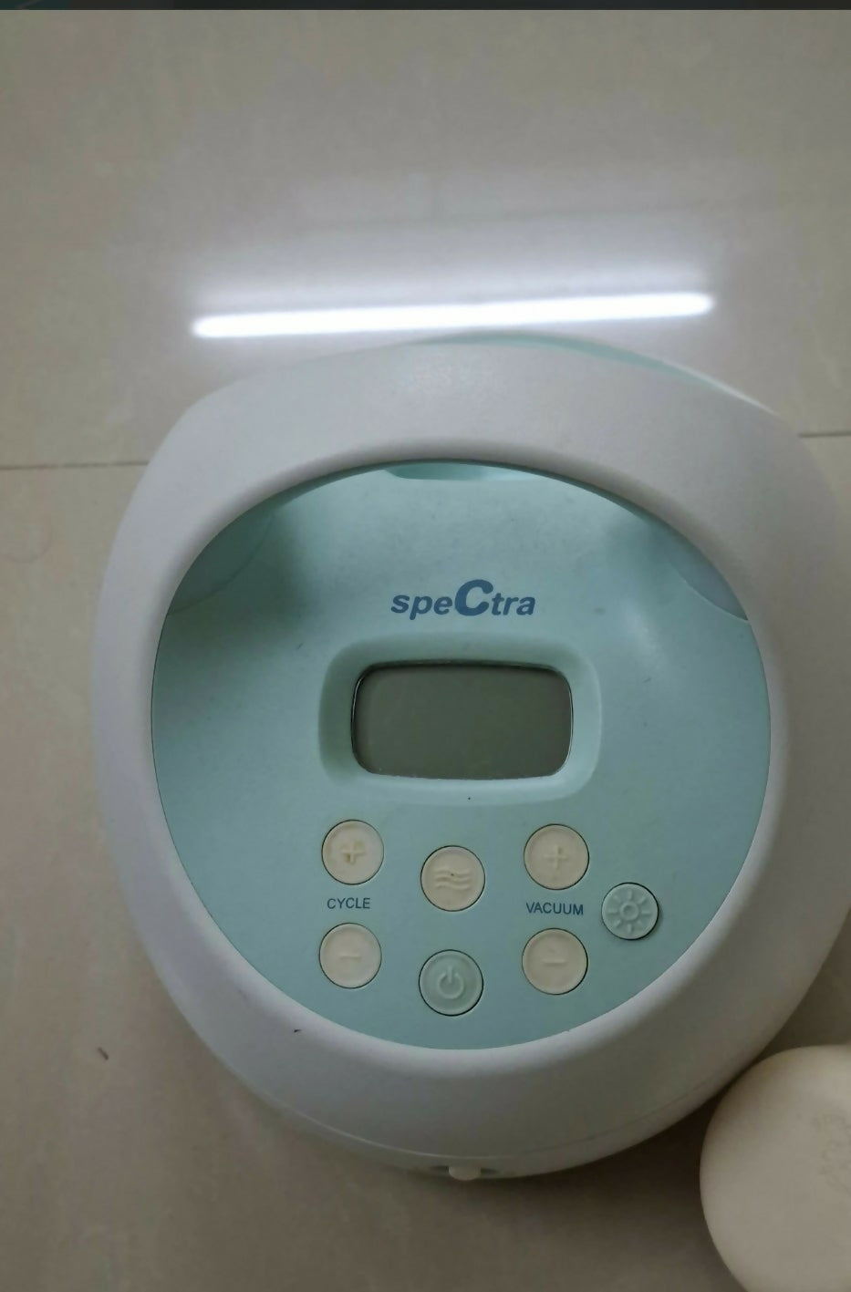 Spectra baby bottle warmer on a light background