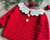 Soft and cozy Sweater, Cap, and Booties Set for babies, offering warmth, comfort, and style for colder days.