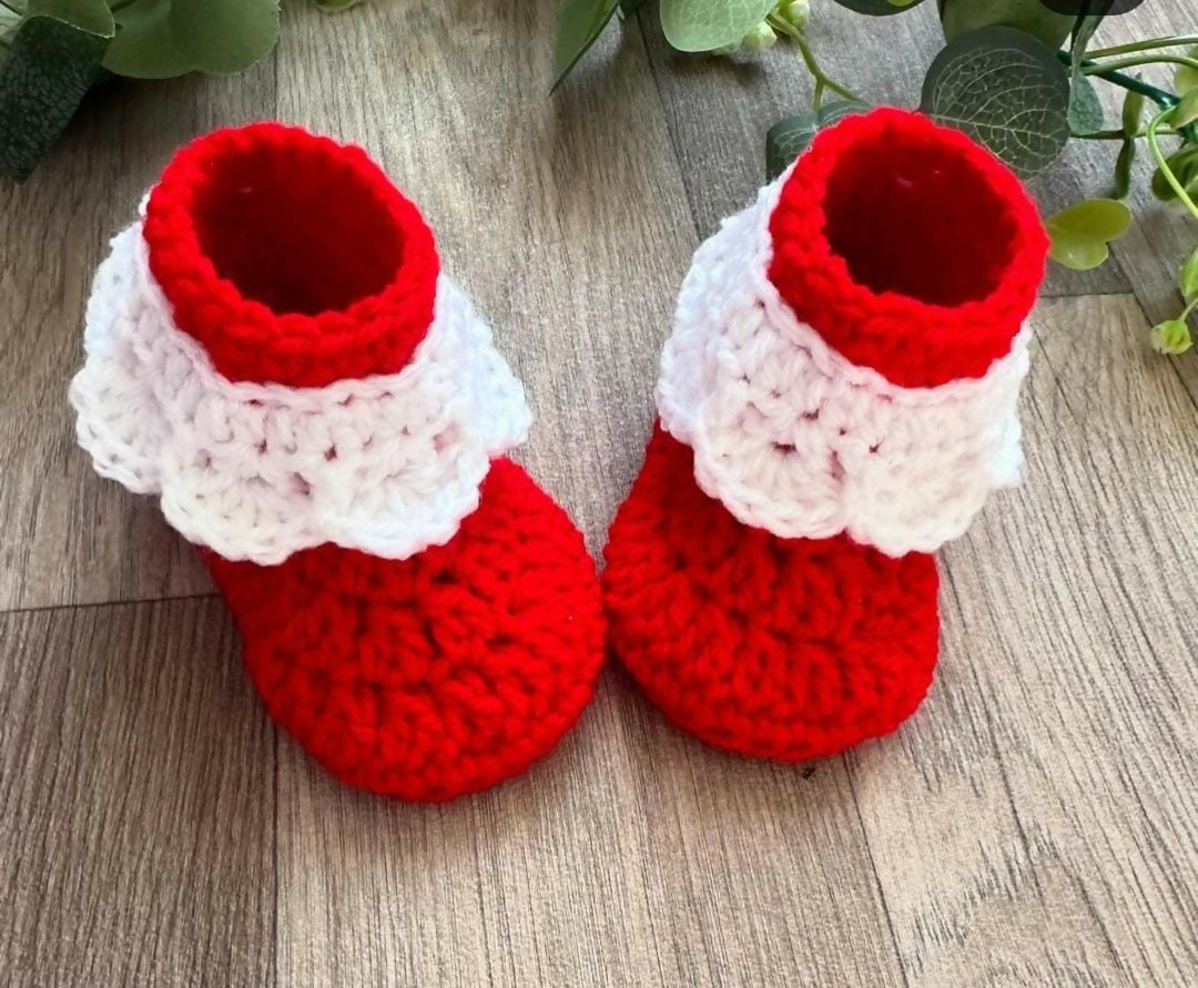 Soft and cozy Sweater, Cap, and Booties Set for babies, offering warmth, comfort, and style for colder days.