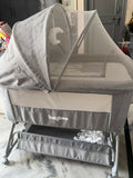 BAYBEE bedside crib bassinet with secure sleeping space, breathable sides, sturdy frame, and compact design for safe bedside sleeping and easy baby access.