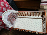 Give your baby a safe and stylish sleeping space with the versatile First Step Cradle perfect for a peaceful nursery!