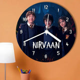 Wall clock with a design of three people in school uniforms