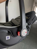 Close-up of a car seat with a visible label