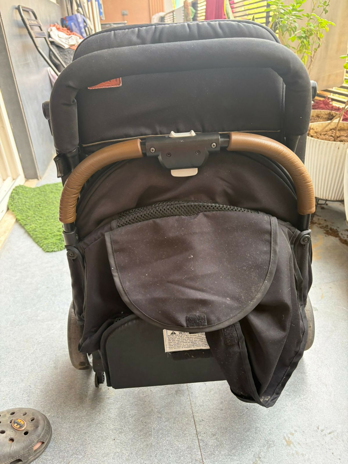 KIDILO one-click foldable baby stroller with compact folding design, reclining seat, sturdy wheels, safety harness, and 20 kg weight capacity for comfortable baby travel.