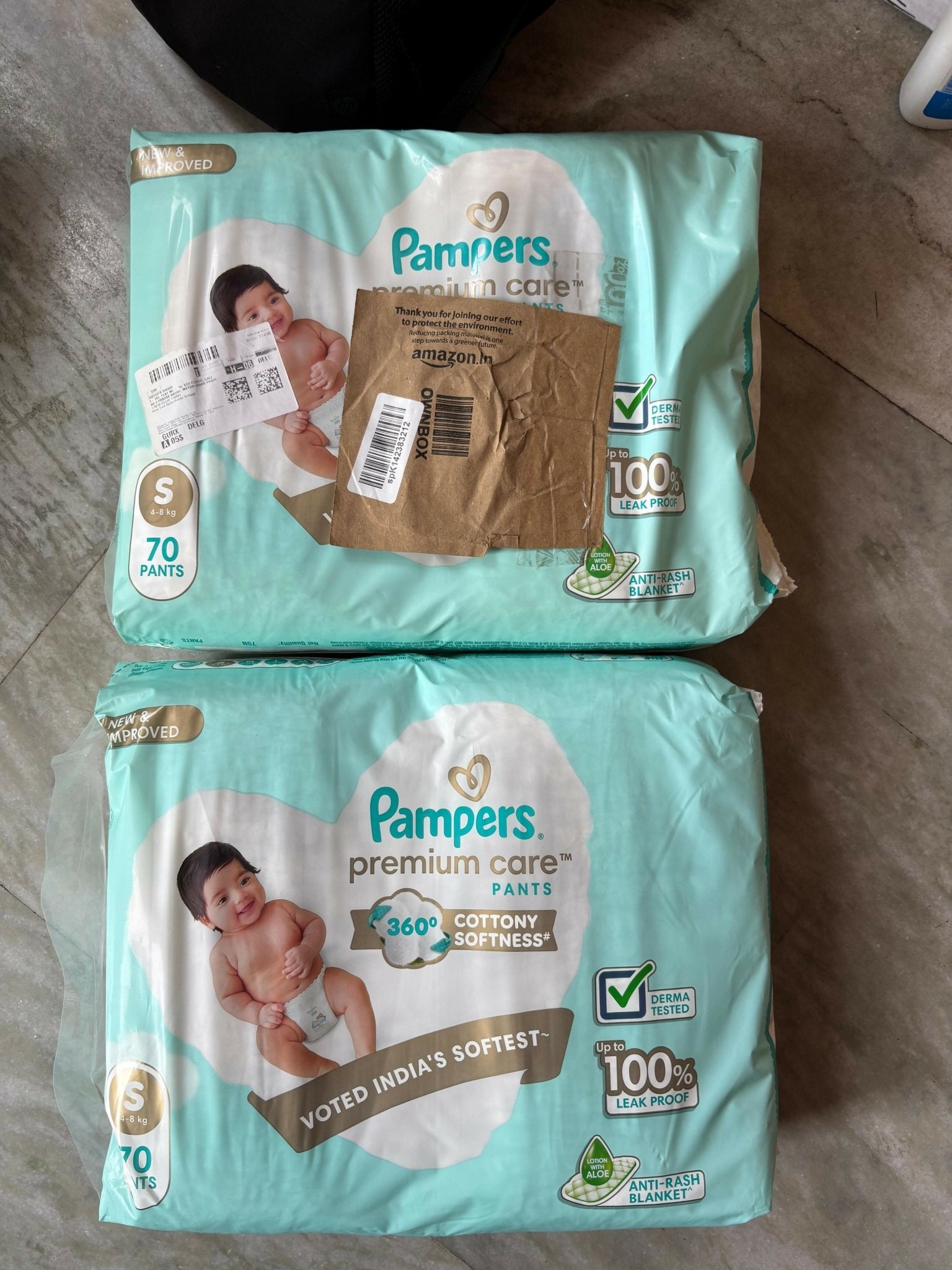 Pampers Baby Diaper Combo with 2 packs of 70 diapers each, featuring soft breathable materials, high absorbency, leak protection, stretchy waistband, and a comfortable fit for babies.