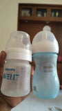 Philips Avent feeding bottle set of 2 with complimentary nipple sets, featuring baby-friendly feeding bottles, anti-colic design, and convenient feeding essentials for newborns and infants.