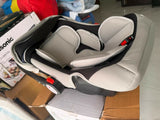R for Rabbit Cozy Carry Cot/Car Seat with rear-facing design, cushioned seating, ergonomic carry handle, 5-point safety harness, and protective canopy for safe and comfortable travel with newborns and infants.