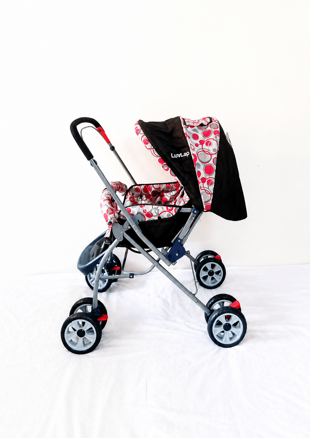 LuvLap reversible handle baby stroller with foldable travel pram design, reclining seat, adjustable canopy, 5-point safety harness, smooth wheels, and storage basket for comfortable travel with babies and toddlers.