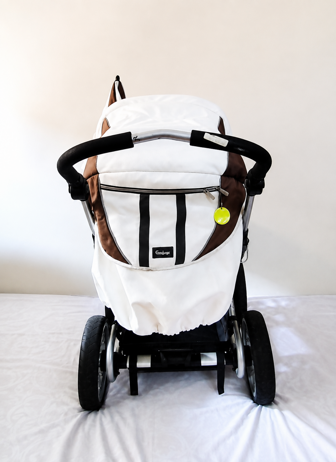 Emmaljunga City Cross Premium Stroller B128 in Almost New condition, available in Chennai, Tamil Nadu, featuring a reversible seat, comfortable reclining design, protective canopy, rain cover, sturdy frame, and smooth wheels.