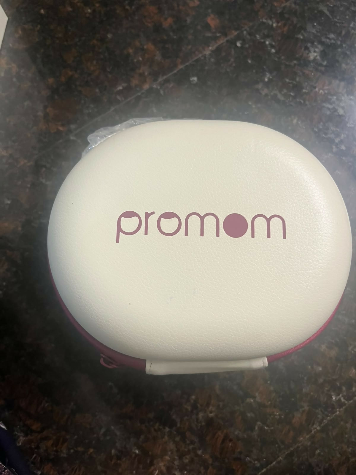 Pro Mom Wearable Breast Pump with a hands-free, compact design, adjustable suction settings, discreet in-bra fit, rechargeable operation, and milk collection cup for convenient pumping at home or on the go.