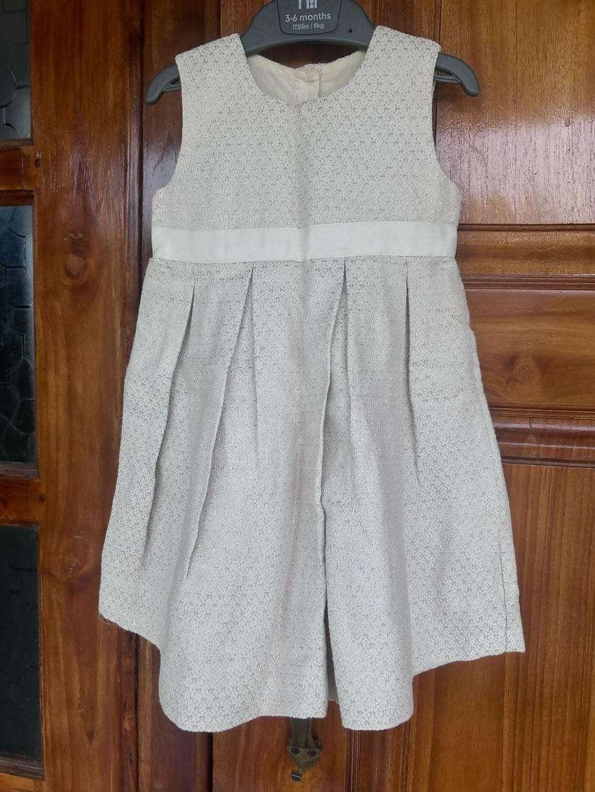 Discover the stylish and comfortable MARKS AND SPENCER Dress/Frock for baby girls, perfect for any occasion with its high-quality fabric and elegant design.